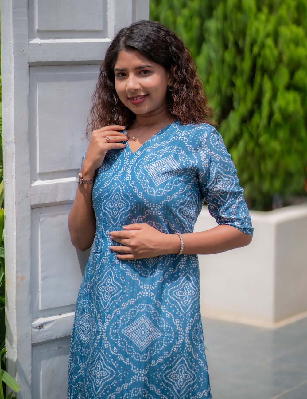 PEACOCK BLUE BANDHINI PRINTED V NECK THANU A-LINE MAXI