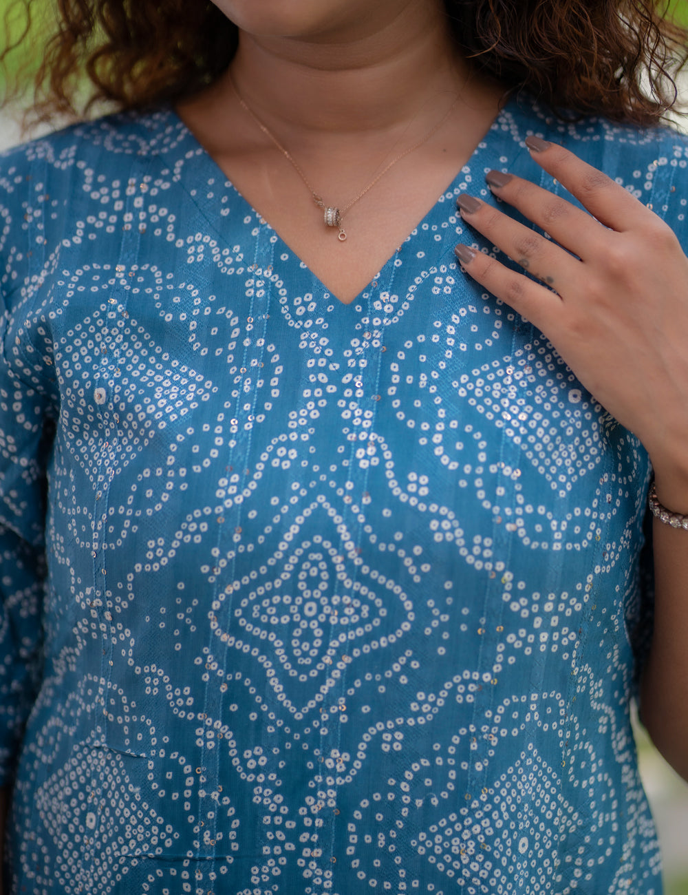 PEACOCK BLUE BANDHINI PRINTED V NECK THANU A-LINE MAXI