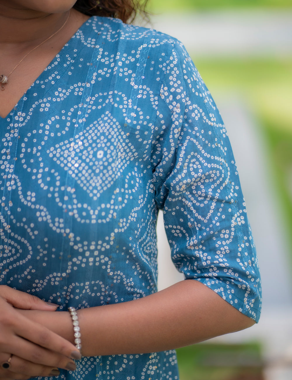 PEACOCK BLUE BANDHINI PRINTED V NECK THANU A-LINE MAXI