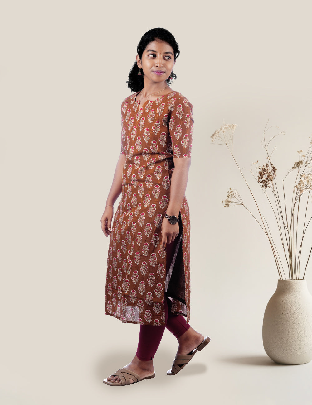 BROWN FLORAL PRINTED OVIYA STRAIGHT KURTI